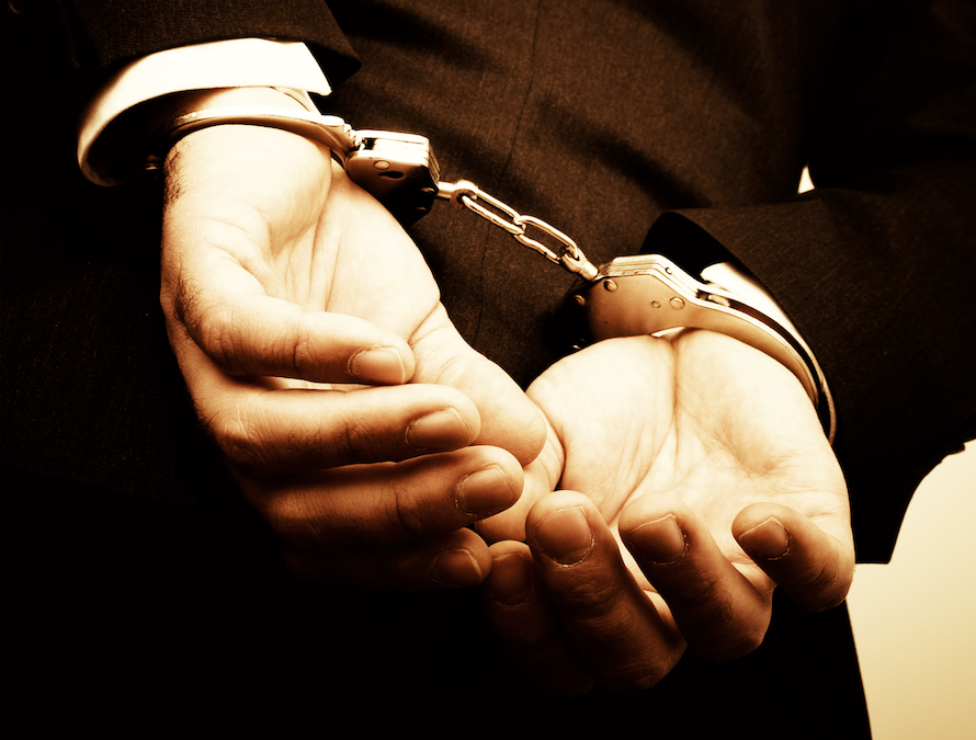 Person in handcuffs representing criminal charges and arrest in St. Louis, Missouri
